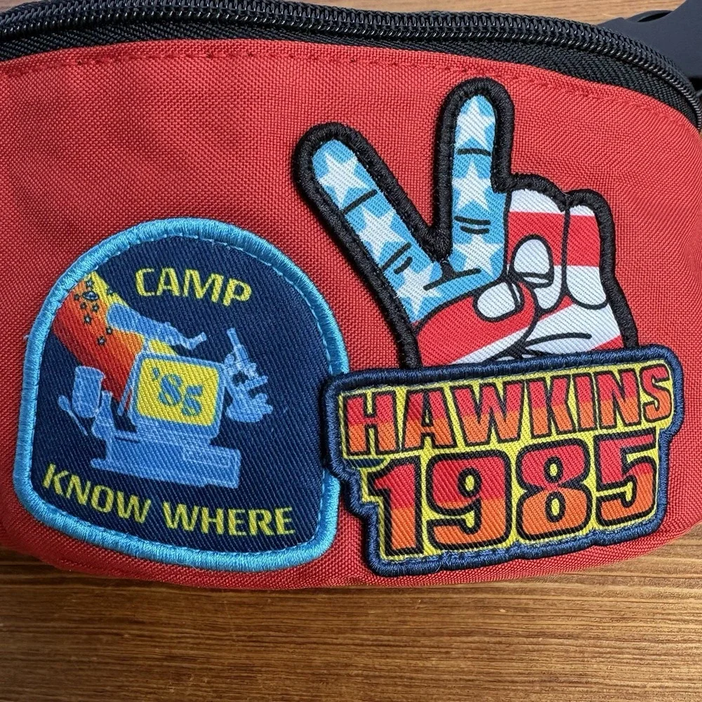Stranger Things Hawkins 1985 Fanny Pack & Hawkins Horrors Book Lot Netflix